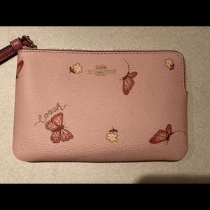 SOLD NWT Coach corner zip wristlet